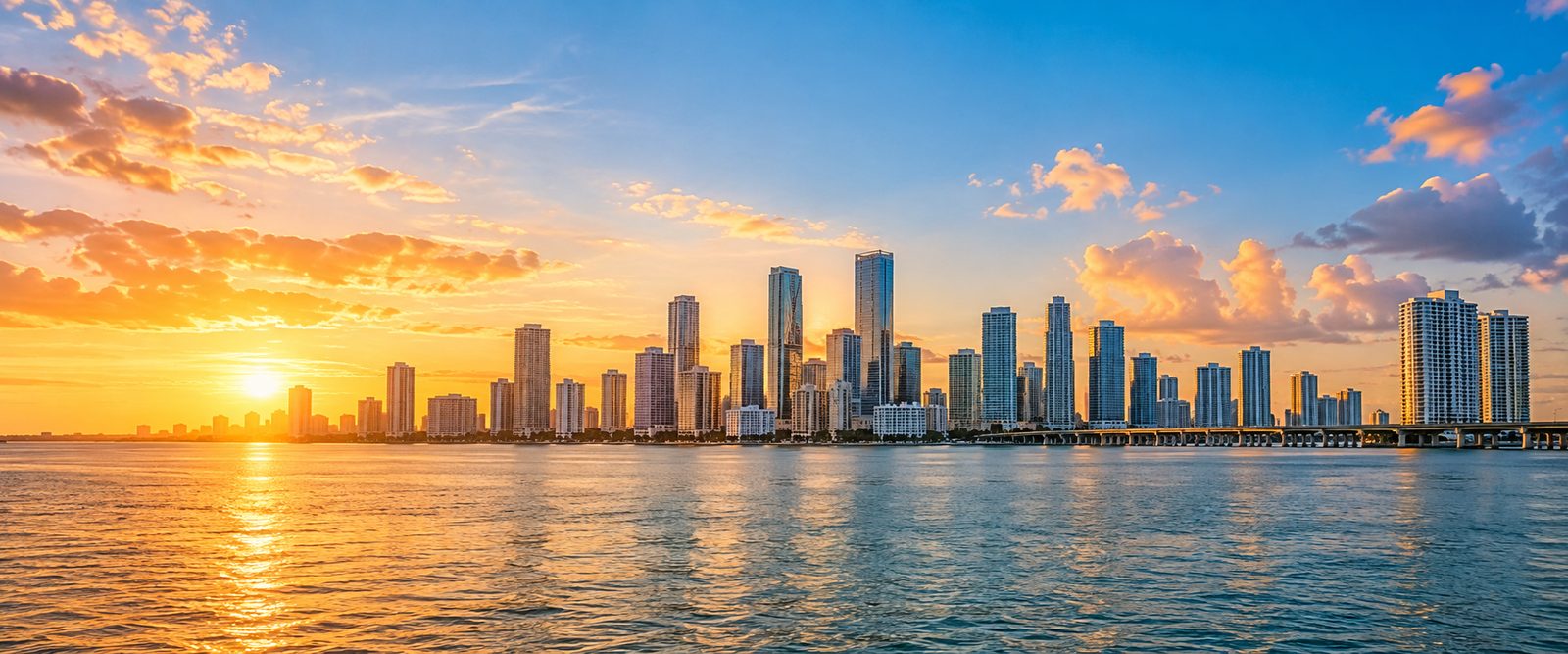 The South Florida skyline in warm late-afternoon light.