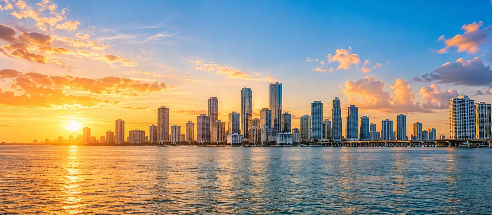 The South Florida skyline in warm late-afternoon light.